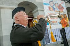 A Caltrans employee plays a bugle while the organization honor the 189 fallen highway workers that have died since 1921. Photo courtesy of Caltrans