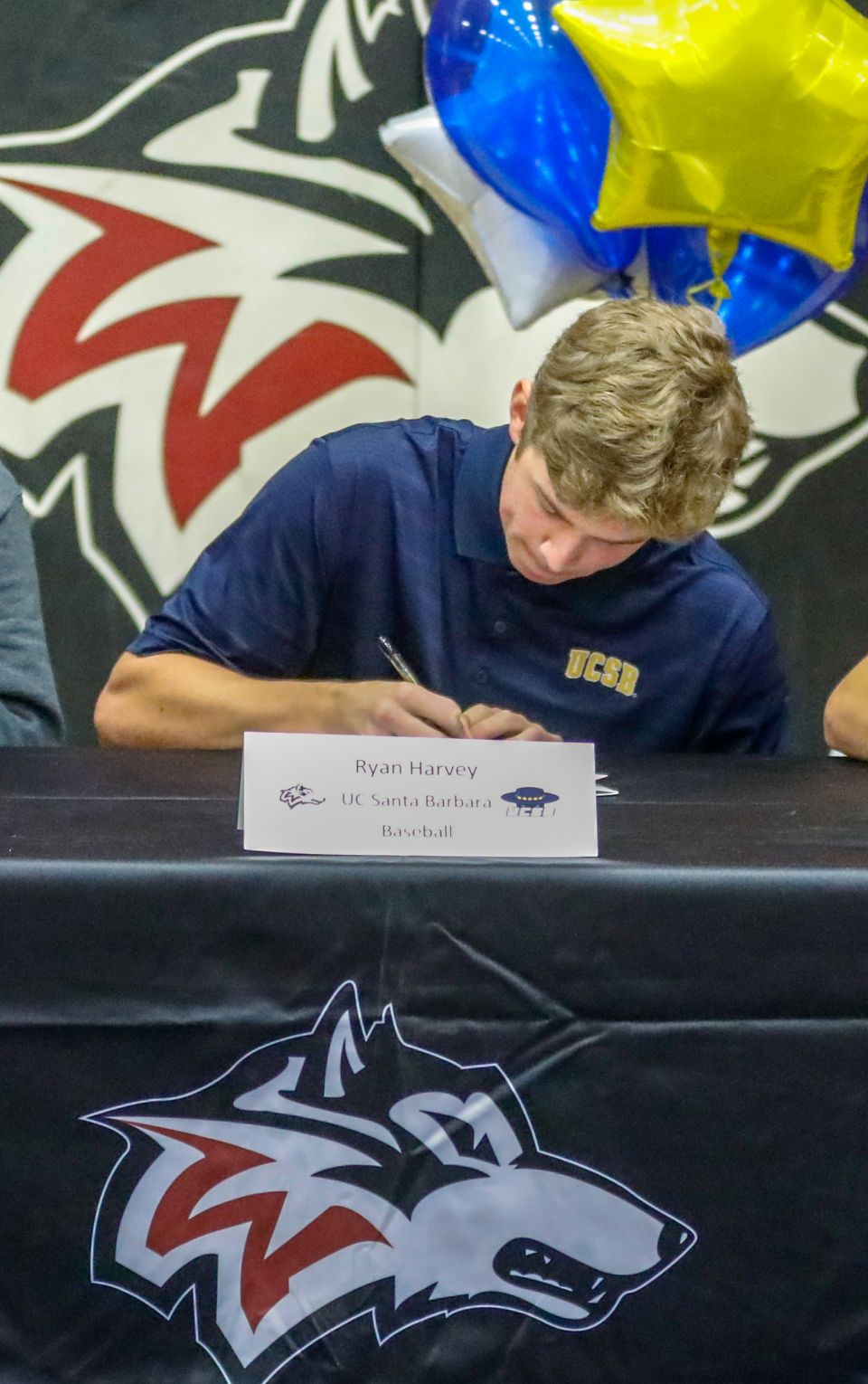 New York Yankees pitcher Ryan Harvey signs his letter of intent to the University of California, Santa Barbara, on Nov. 4, 2018, at Woodcreek High School in Roseville. Photo courtesy of Allene Salerno/Lenie’s Pictures ™ (leniespictures.smugmug.com)