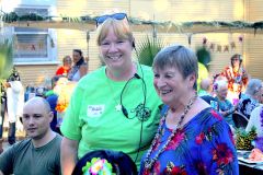 A happy Michelle Grant (left), Center head of public relations and organizer of the second annual Citrus Heights Veterans Community Center luau with Center owner, Jean Rounsavell (right). Photo courtesy of Ryan Grant